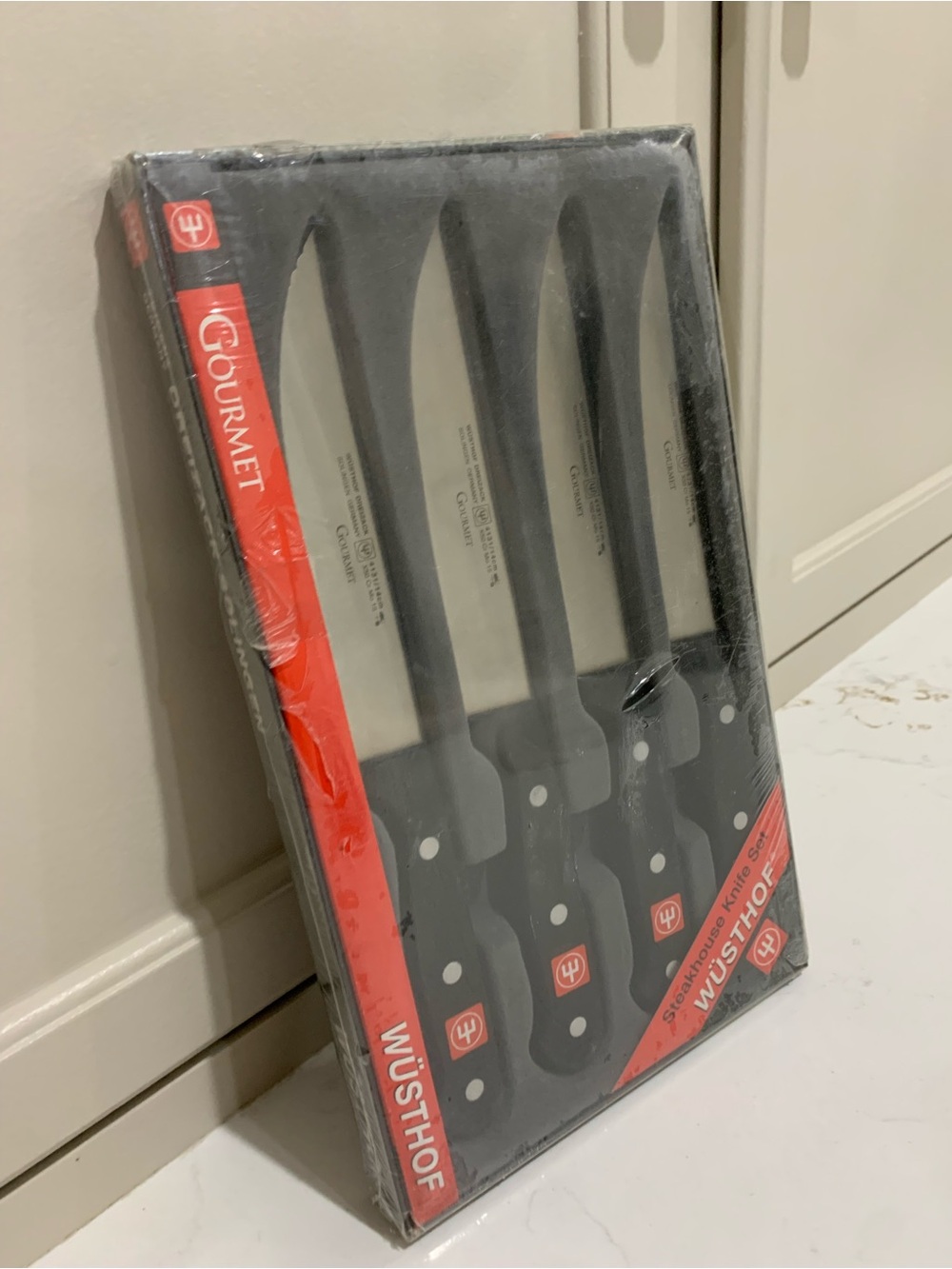WÜSTHOF Gourmet 4-Piece Steak Knife Set - Black Handles